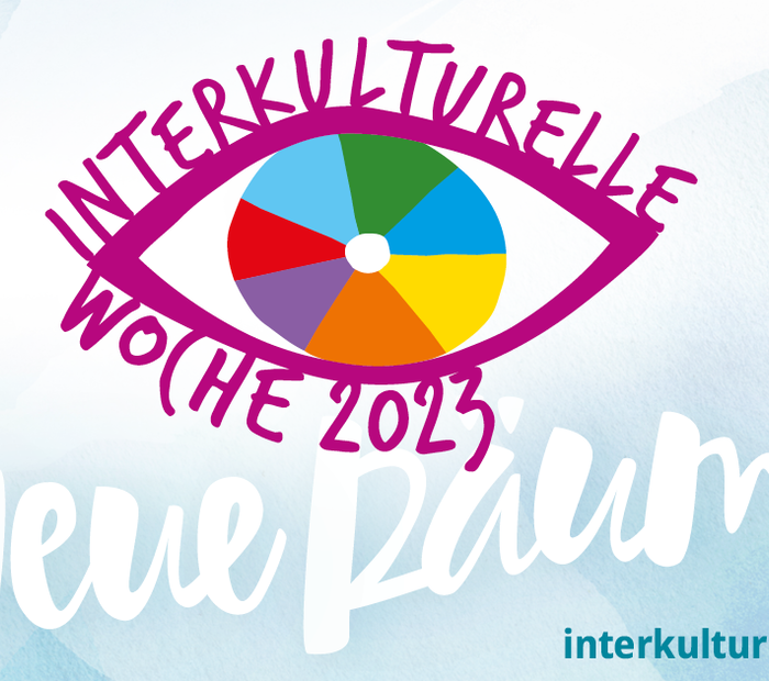 Logo der Interkulturellen Woche 2023 mit buntem Auge